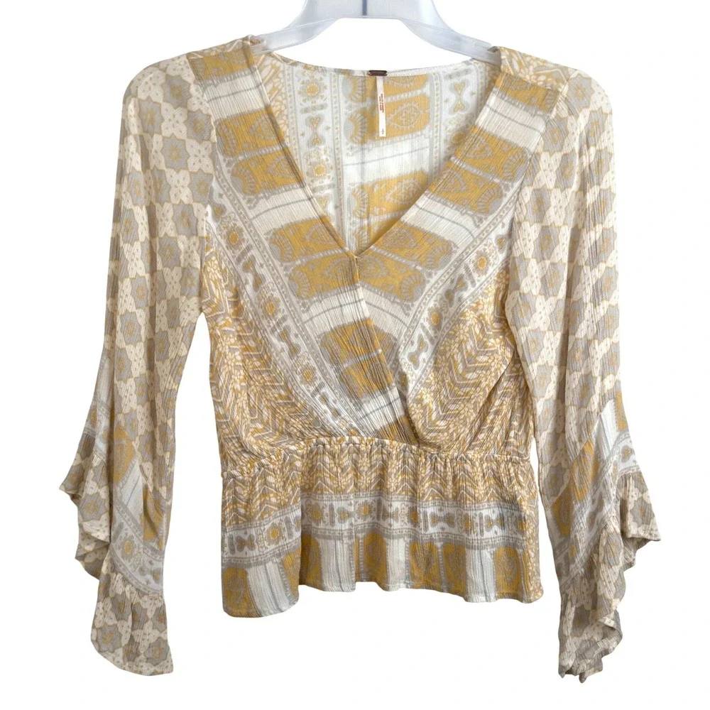 Free People Smocked Peplum‎ Blouse S Yellow Boho Ruffle Sleeve Wrap Top